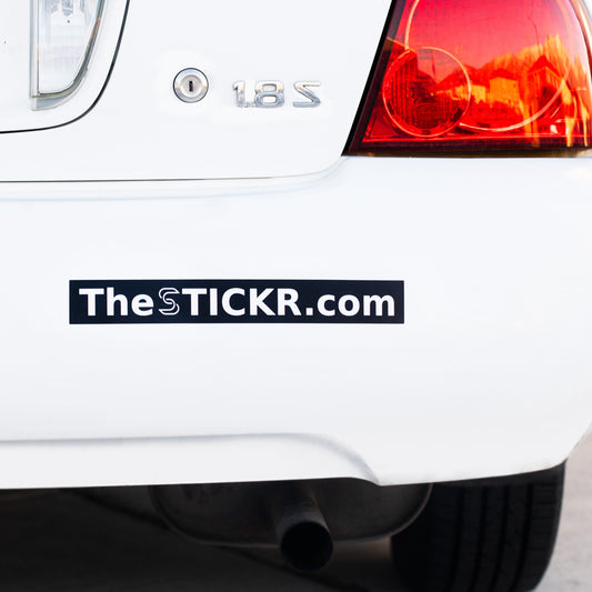 A rectangular bumper sticker with thestickr.com website on a car bumper